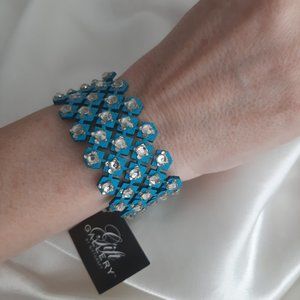 Rhinestone studded wrist wrap/bracelet. Faux Leather. Reversible.